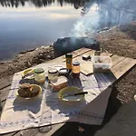 Talo Kainuun Korvessa Kiekinkoskella
