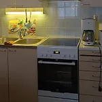 Talo Kainuun Korvessa Kiekinkoskella