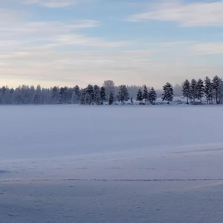 Talo Kainuun Korvessa Kiekinkoskella *