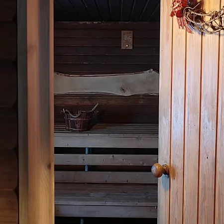 Talo Kainuun Korvessa Kiekinkoskella Kuhmo