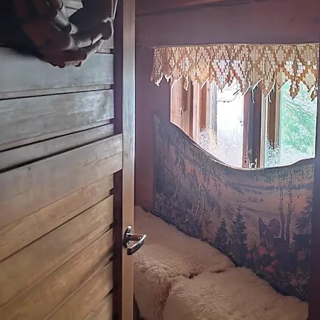 Talo Kainuun Korvessa Kiekinkoskella Kuhmo