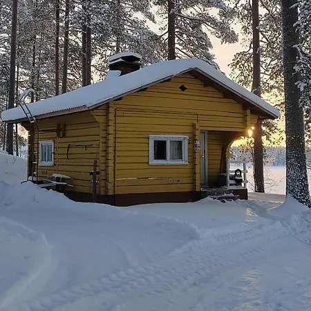 Talo Kainuun Korvessa Kiekinkoskella *