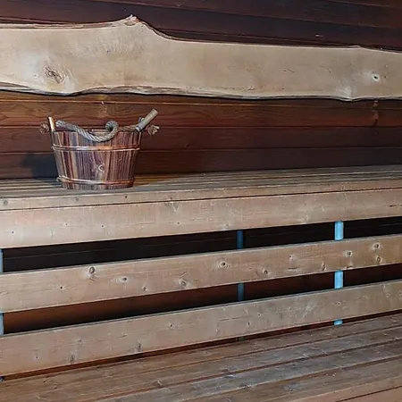 Talo Kainuun Korvessa Kiekinkoskella *