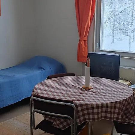 Talo Kainuun Korvessa Kiekinkoskella Chalé