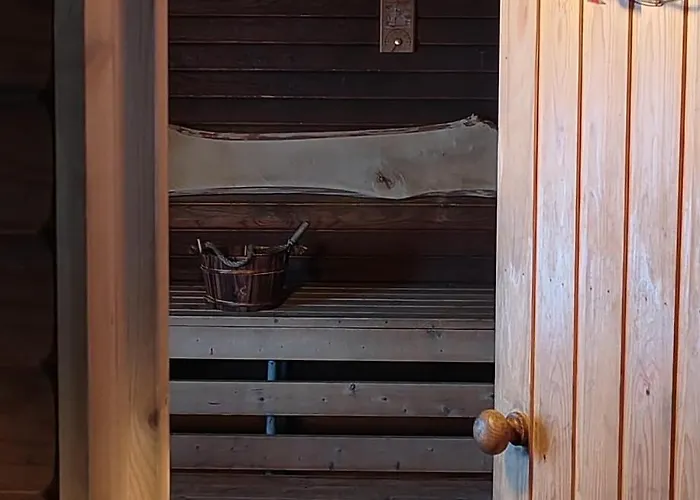 Talo Kainuun Korvessa Kiekinkoskella Kuhmo