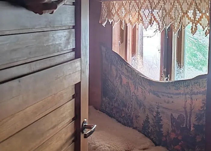 Talo Kainuun Korvessa Kiekinkoskella Kuhmo