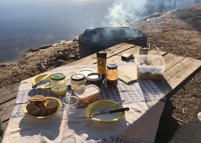 Talo Kainuun Korvessa Kiekinkoskella
