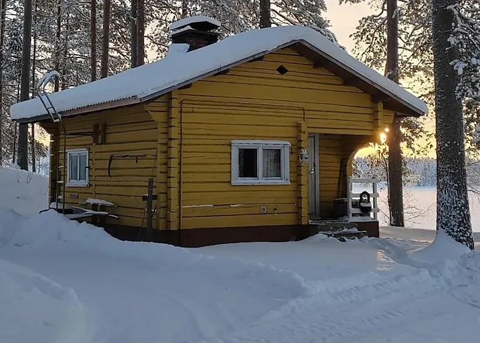 Talo Kainuun Korvessa Kiekinkoskella *