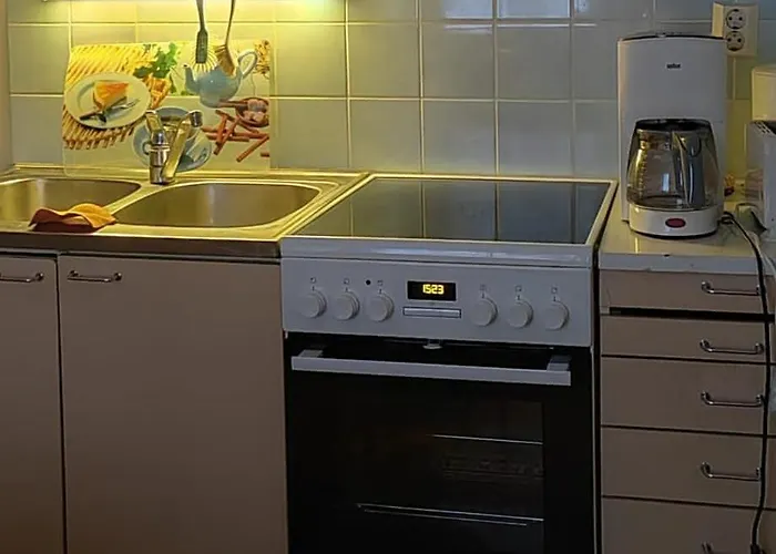 Talo Kainuun Korvessa Kiekinkoskella